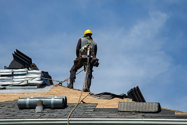 Professional Roof Replacement technician working in Wright City, MO